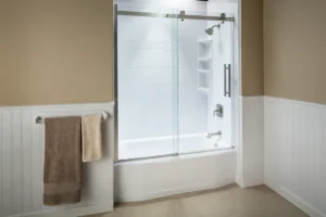 Bathroom walls and wainscoting with white beadboard paneling and modern tub shower combo